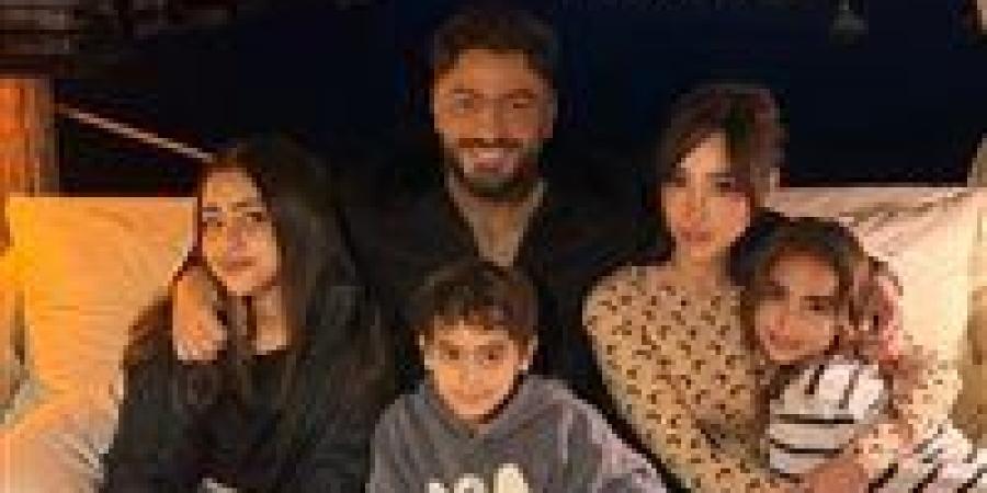 بسمة بوسيل تحتفل بالعام الجديد رفقة طليقها تامر حسني وأبناءهم| صور - تواصل نيوز