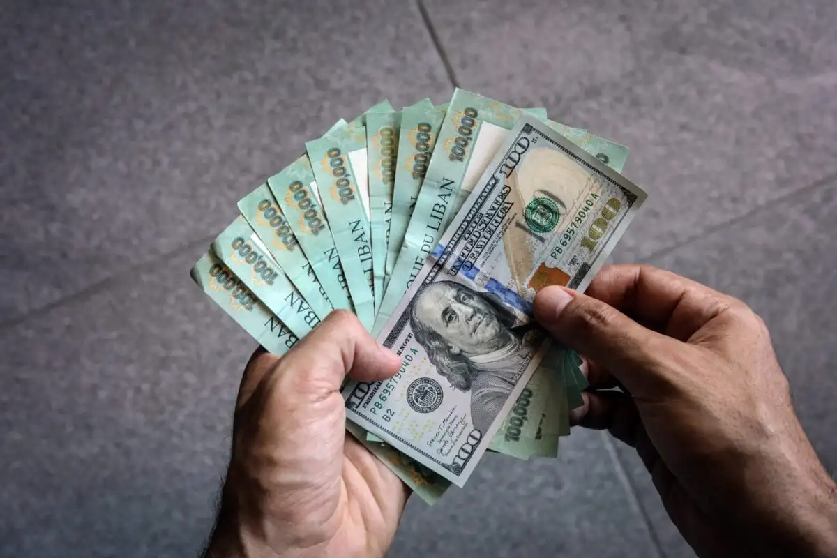 سعر صرف 100 دولار مقابل الدينار العراقي اليوم