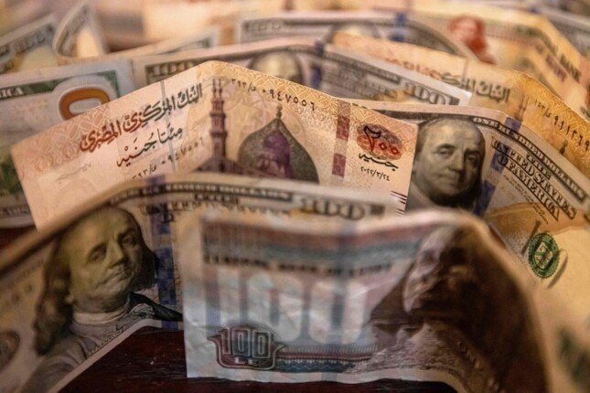 الدولار يتراجع 9 قروش في منتصف تعاملات اليوم بالبنوك وسط تذبذبات السوق